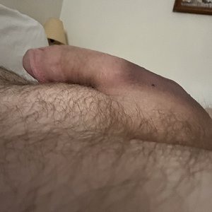 Flaccid cock resting on my stomach